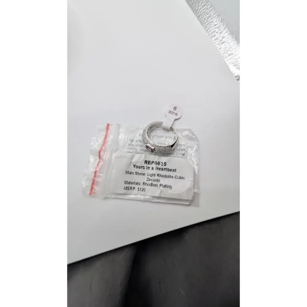 Elegant Silver Ring with Embedded Stones Size 9
